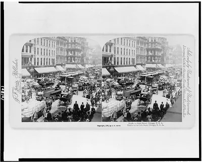 Traffic on State Street, Chicago, U.S.A. =Trafico en la Calle State, Chicago, E.U.A.