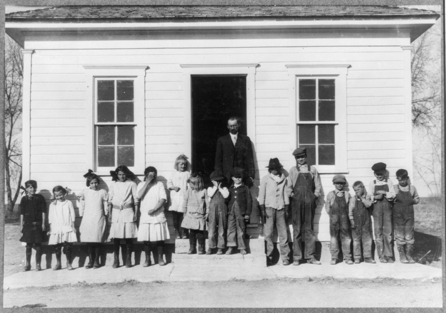 Attendance at the Jeffers School on November 30. 15.15 in attendance and more to come. Location: Loveland [vicinity], Colorado / L.W. Hine., 1915 November 30. — historic photograph