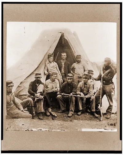 Group of soldiers of Co. G. 71st New York Volunteers posed in front of tent