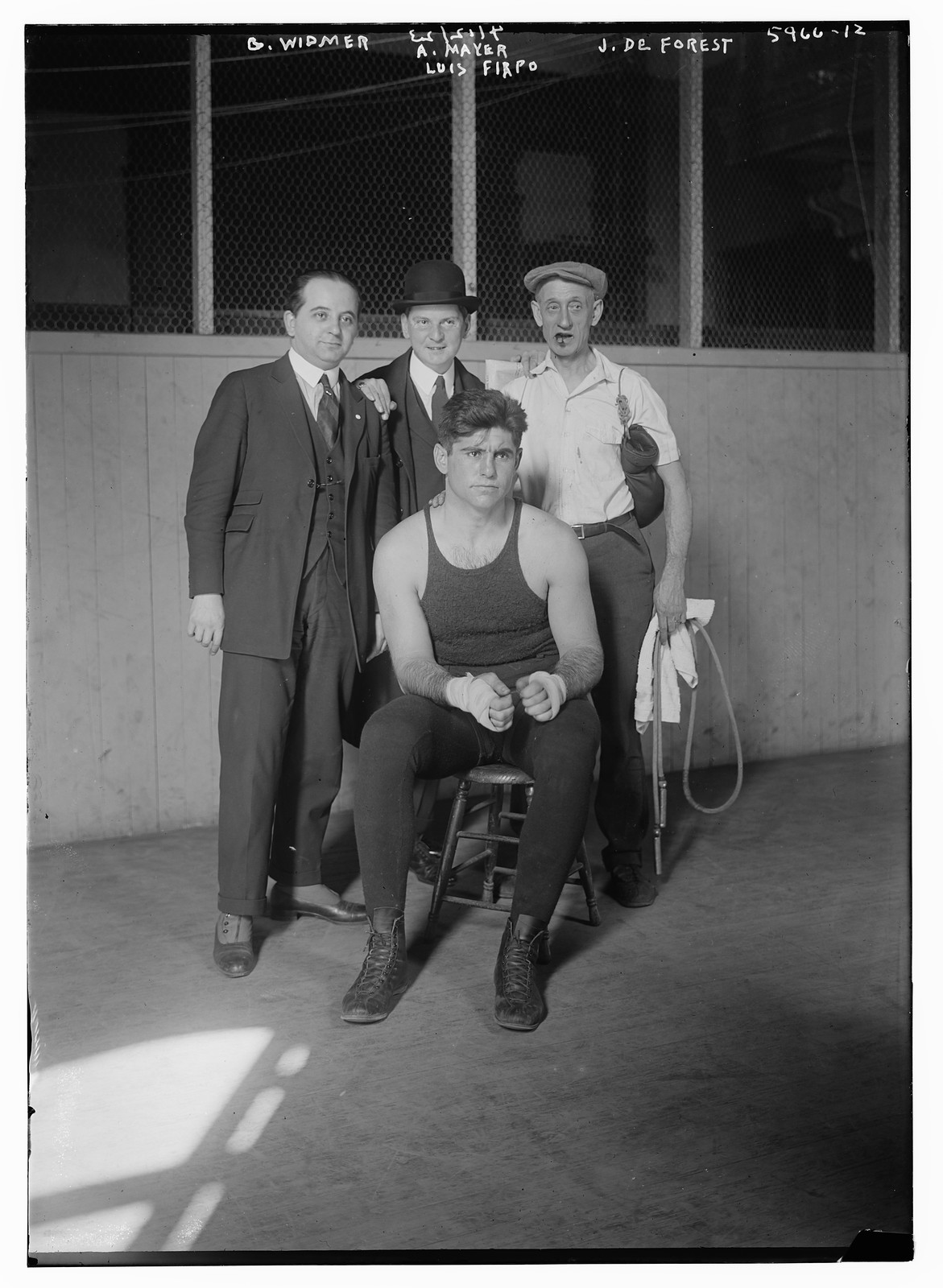 Luis Firpo and handlers 4/12/23, 4/12/23. — historic photograph