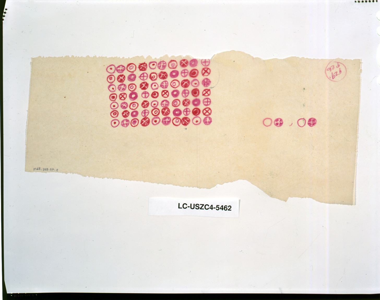 Torn sheet with rows of pink circled crosses and dots — historic image