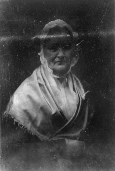 [Mary Woodburn Greeley, half-length portrait of a woman, slightly to the right, facing front, wearing spectacles]