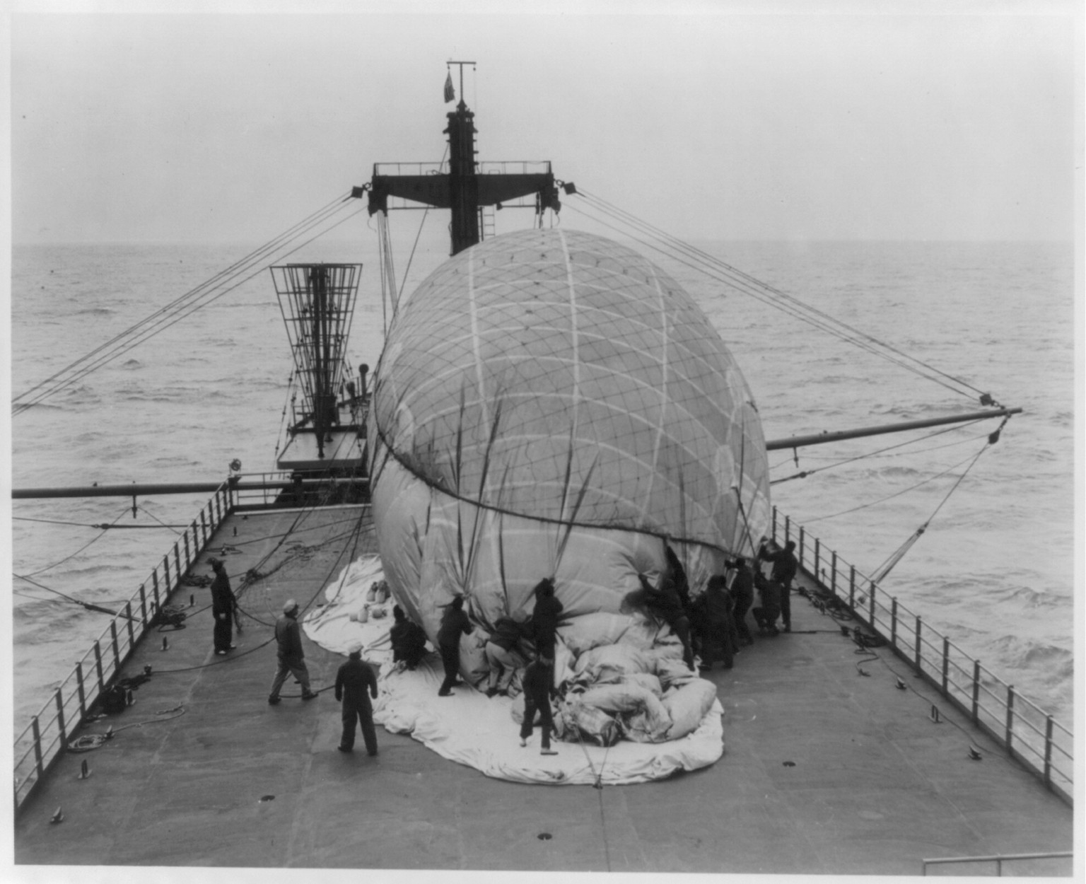 Captive balloon supports Voice of America" antenna", 1952 March 7-8. — historic photograph
