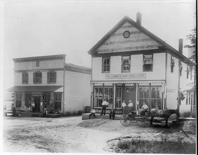 [Va. - Cumberland - Cumberland Drug Store and J.R. Godsey & Co. store from across main street]