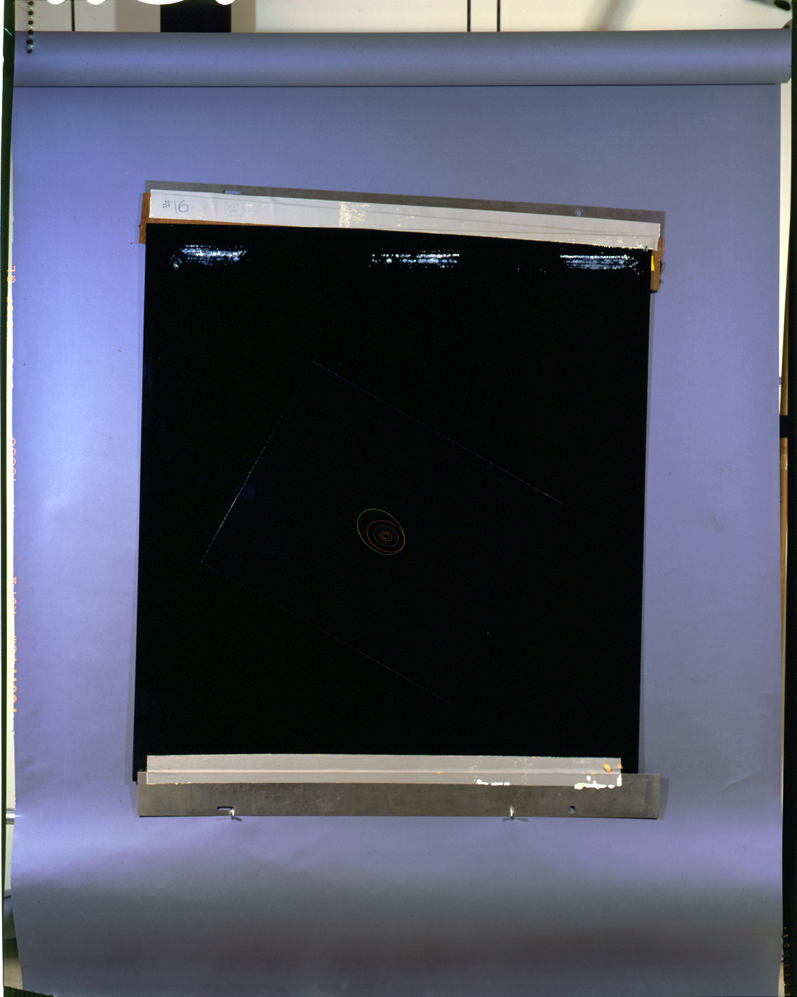 Black glass plate labelled #16 on blue backing — historic image