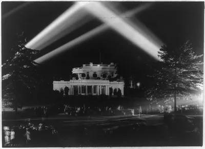 D.C., Washington. White House. Exterior. 1919. View at night.