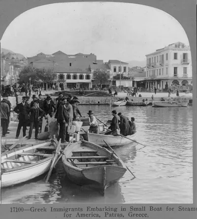 Greek immigrants embarking in small boat for steamer for America, Patras, Greece