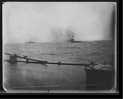 U.S.S. Oregon, engaging shore batteries at Santiago