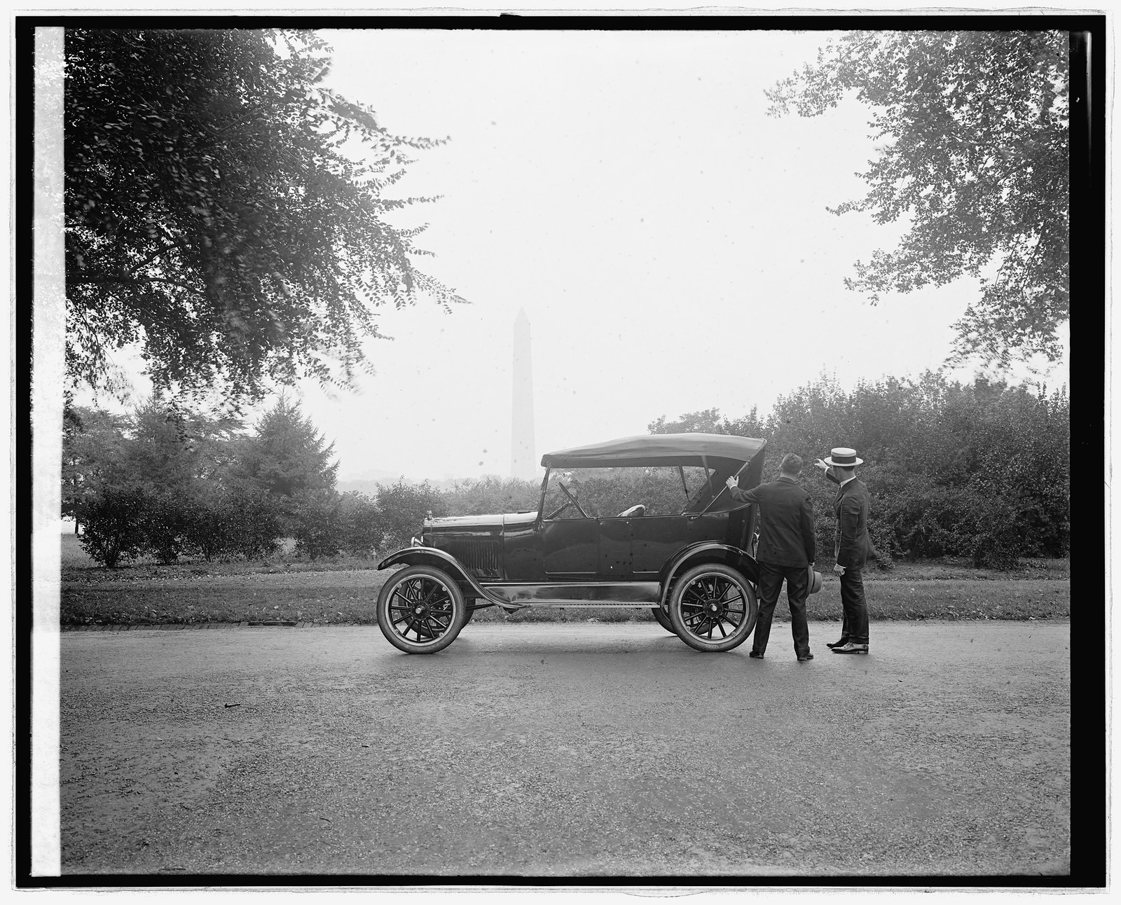 Ford Motor Co., Ford touring car at Monument, [Washington, D.C.], [between 1910 and 1926] — historic photograph