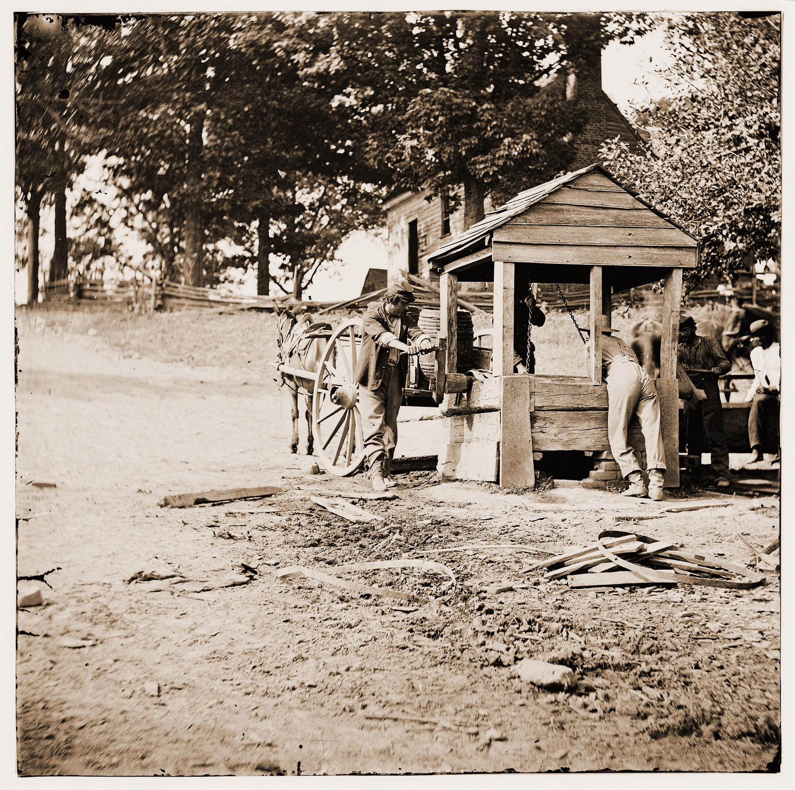 Fredericksburg Virginia. Soldiers drawing water from a well. Army of the Potomac, 1864 — historic photograph