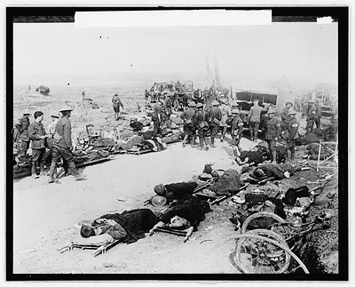 [Casualties on stretchers, Red Cross]