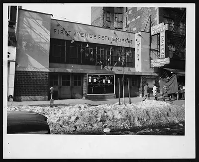 First Avenue Retail Market building with snowbanks on street