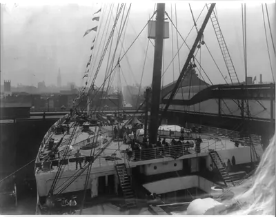 [The S.S. OLYMPIC, 1911: Fore deck at dock in New York Harbor]