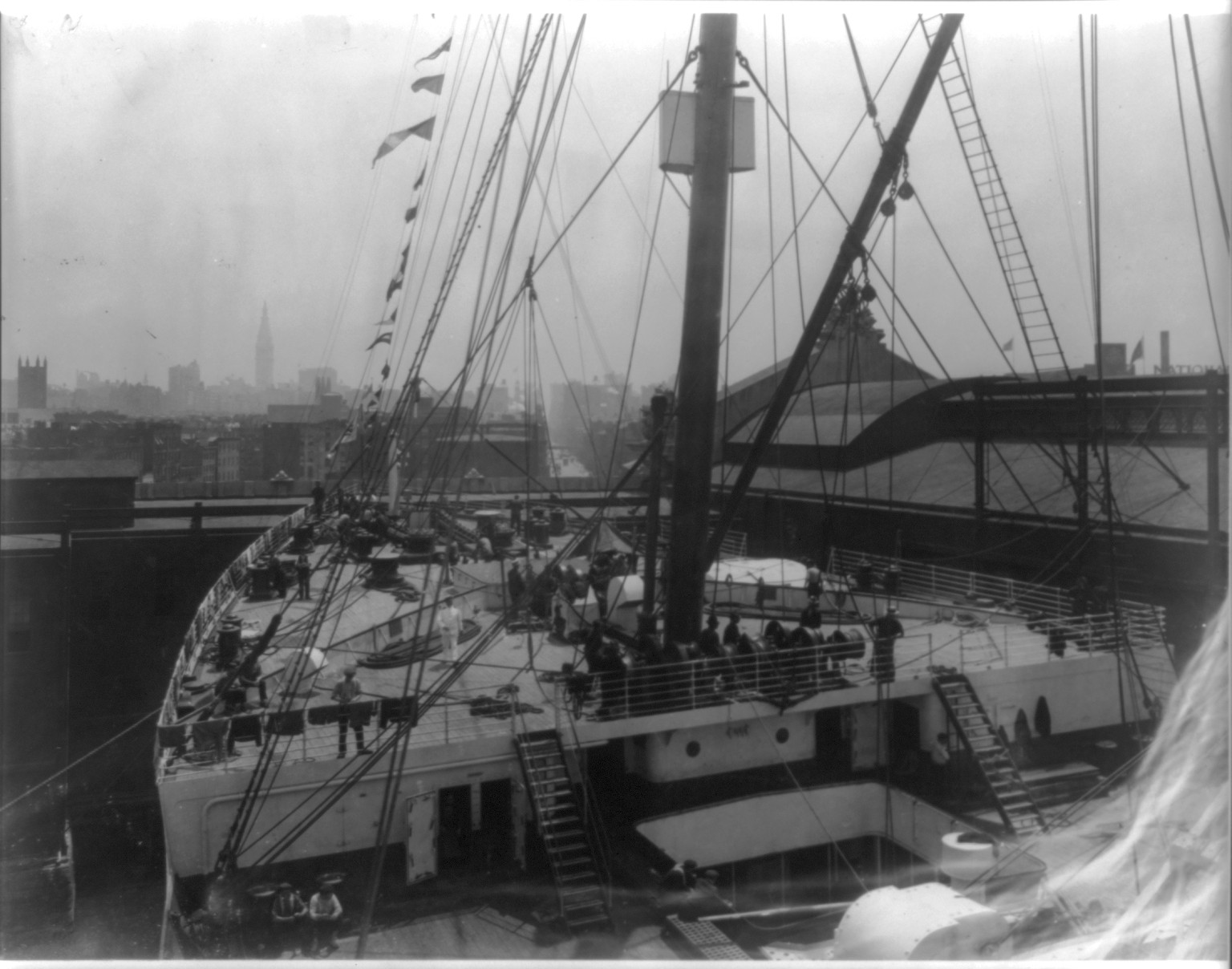 [The S.S. OLYMPIC, 1911: Fore deck at dock in New York Harbor], c1911. — historic photograph