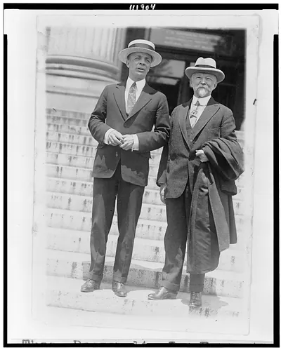 [Theodore Roosevelt, Jr. standing on steps with Charles Lathrop Pack, full-length portraits]