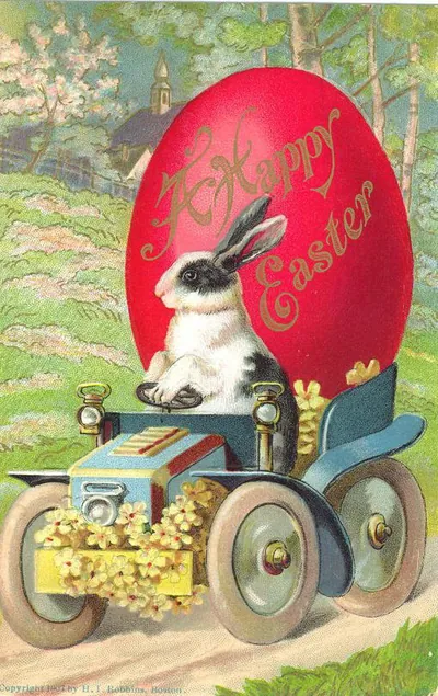 Rabbit driving a car beside a red Happy Easter egg