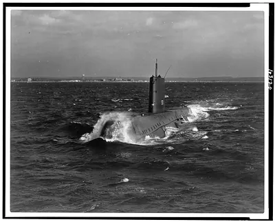 USS Nautilus (SS-571), the Navy's first atomic-powered submarine on its initial sea trials / Official U.S. Navy photo.
