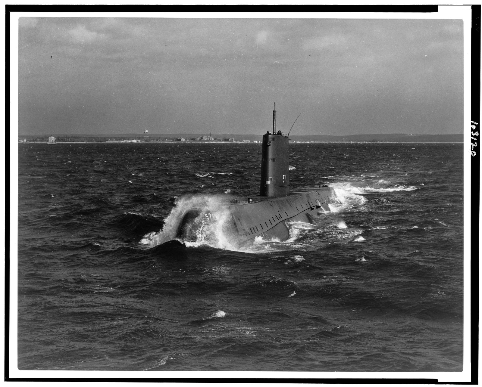 USS Nautilus (SS-571), the Navy's first atomic-powered submarine on its initial sea trials / Official U.S. Navy photo., 1955 Jan. 20. — historic photograph