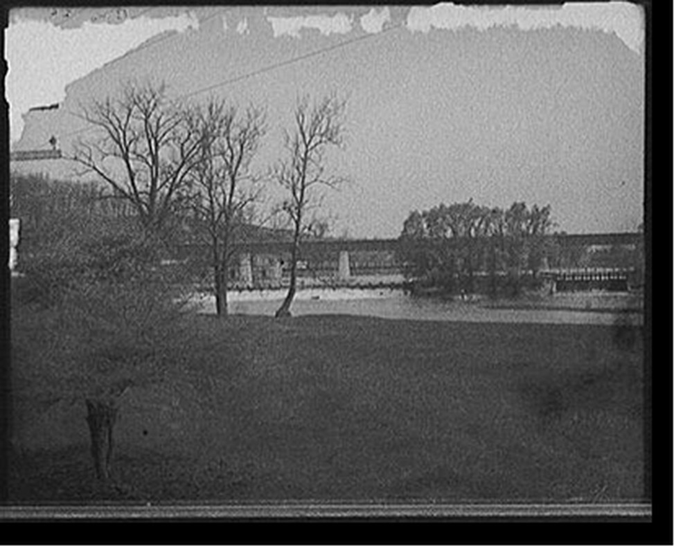[Huron River, railroad bridge and dam, Ann Arbor, Mich.], [between 1905 and 1915] — historic photograph