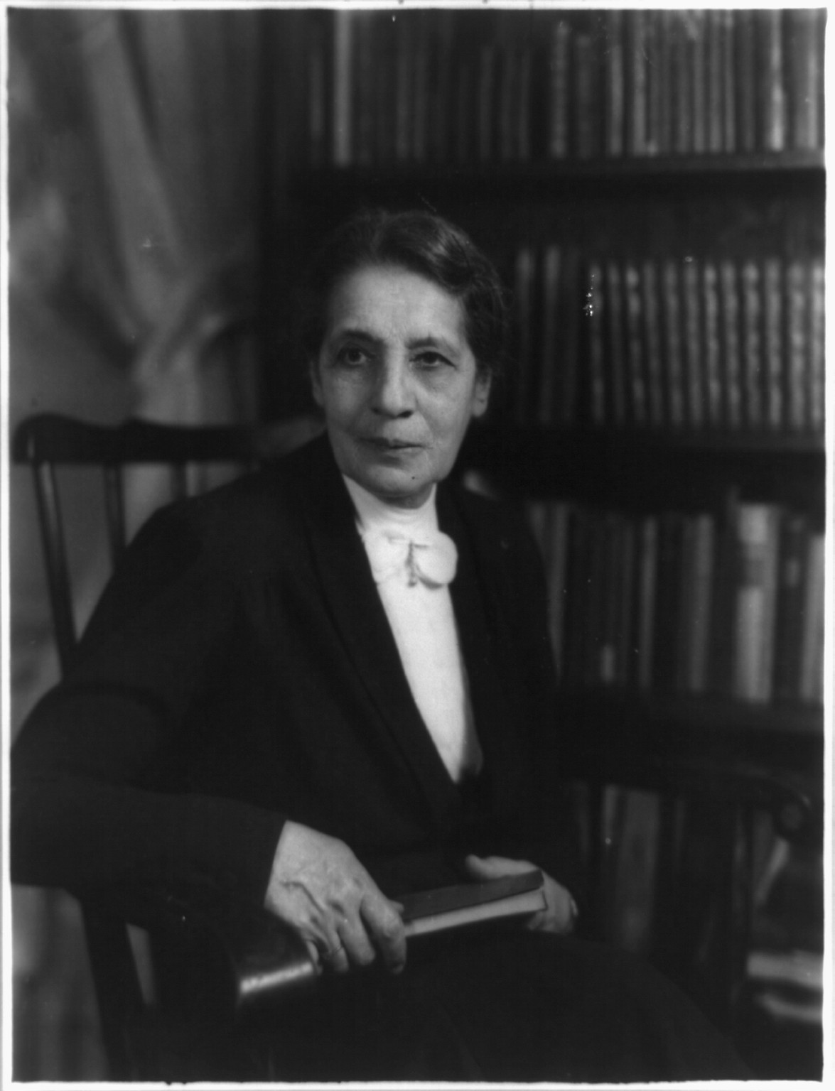 [Dr. Lise Meitner, Austrian physicist, three-quarter length portrait, seated, facing left], [between 1940 and 1960] — historic photograph