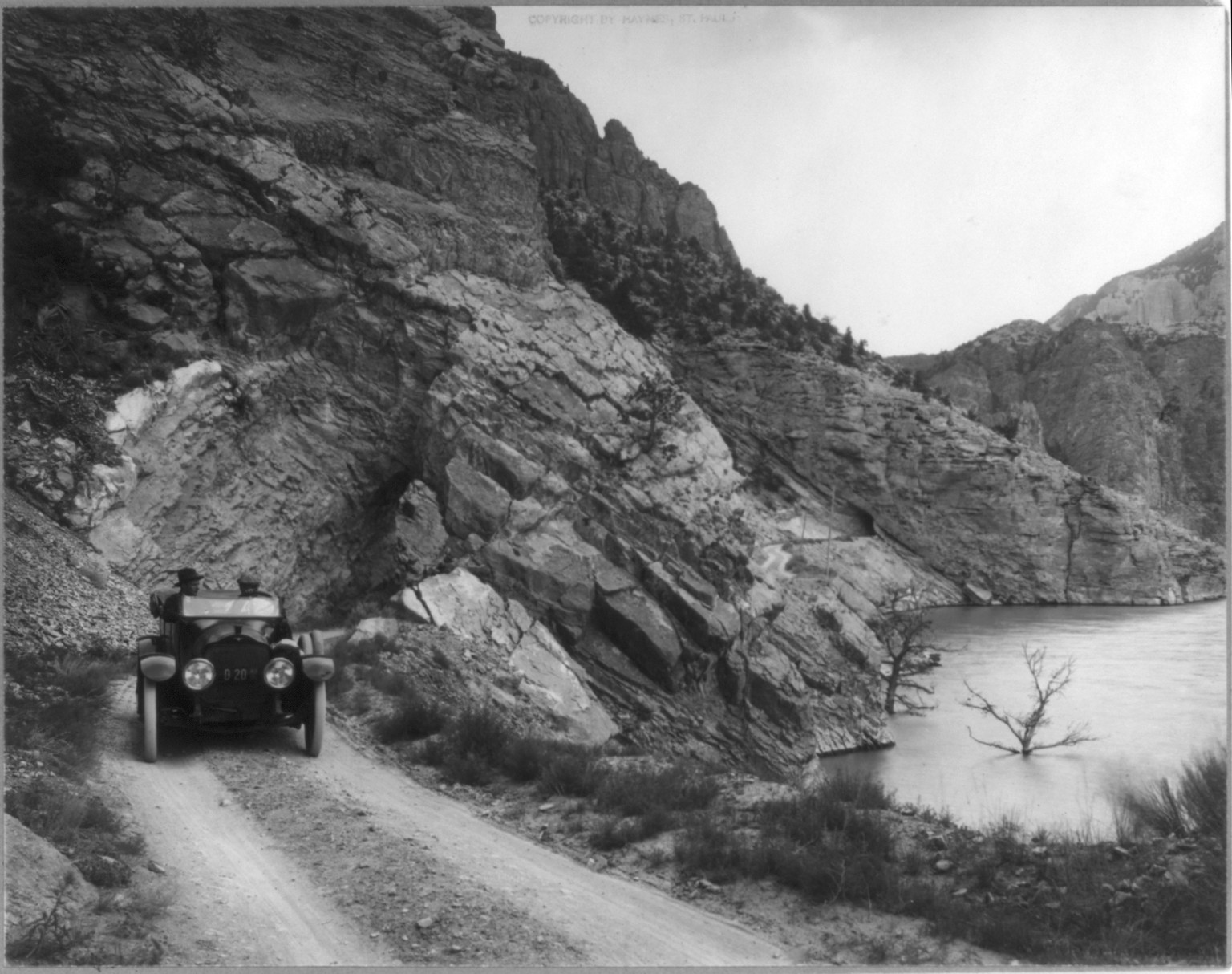 Yellowstone National Park: Auto above Shoshone dam, c1917. — historic photograph