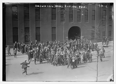 Employees of the Baldwin Locomotive works standing outside bldg., Philadelphia