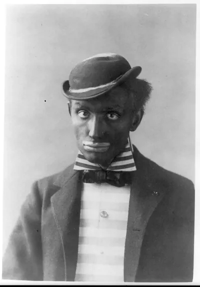 Man in blackface as minstrel