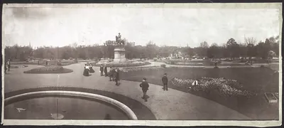 Panoramic view of park with equestrian statue and fountain