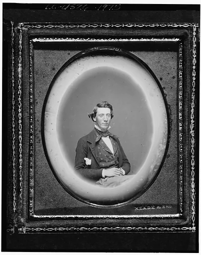 [Charles M. Norton, three-quarter length portrait]