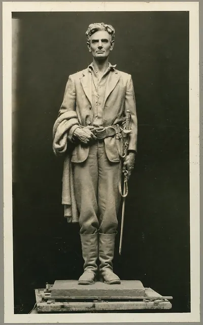 Photograph of a sculpted figure of Abraham Lincoln with sword