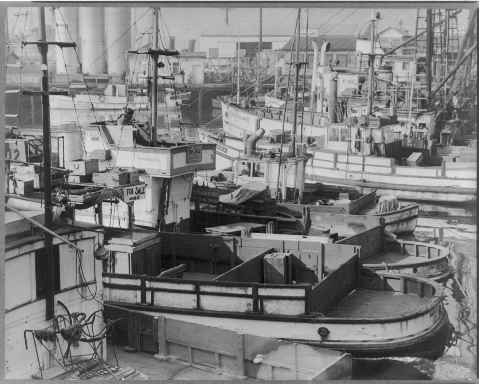 San Pedro, Cal. Apr. 1942. Fishing boats, formerly operated by residents of Japanese ancestry, tied up for the duration in Los Angeles harbor, 1942 April. — historic photograph