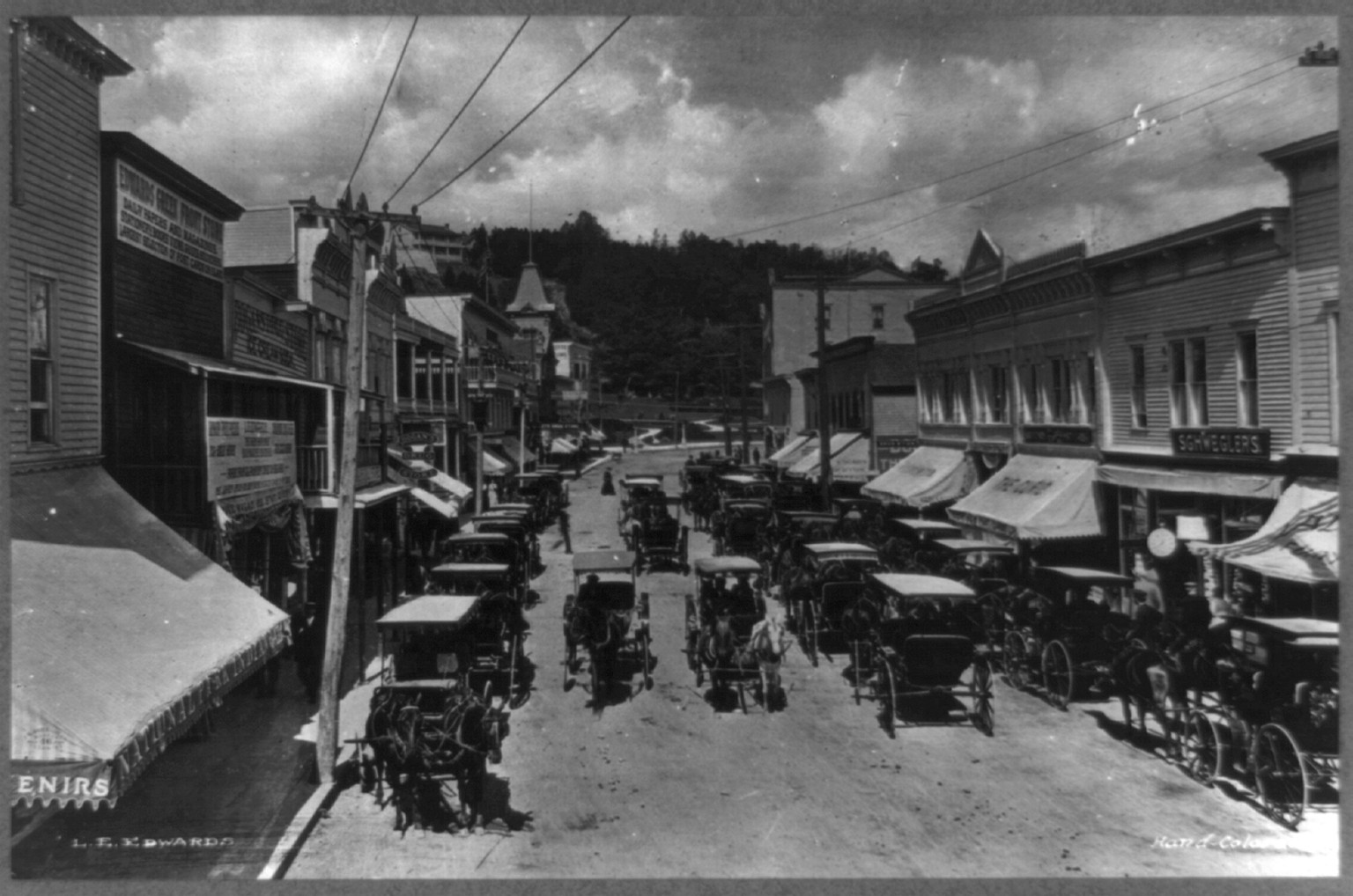 Horse-drawn vehicles on Main Street, Mackinac Island, Michigan, [between 1890 and 1910] — historic photograph