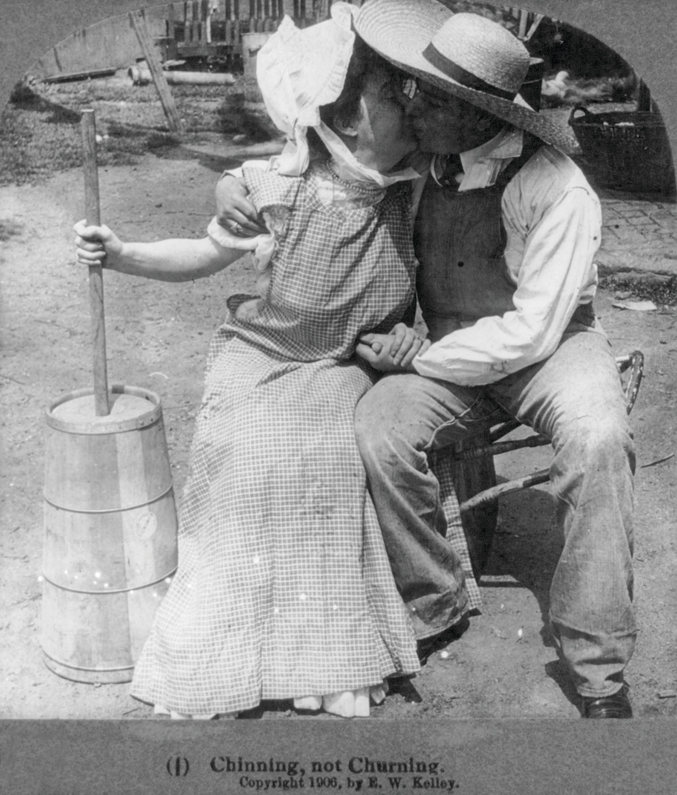 Chinning, Not Churning, 1906 — historic photograph