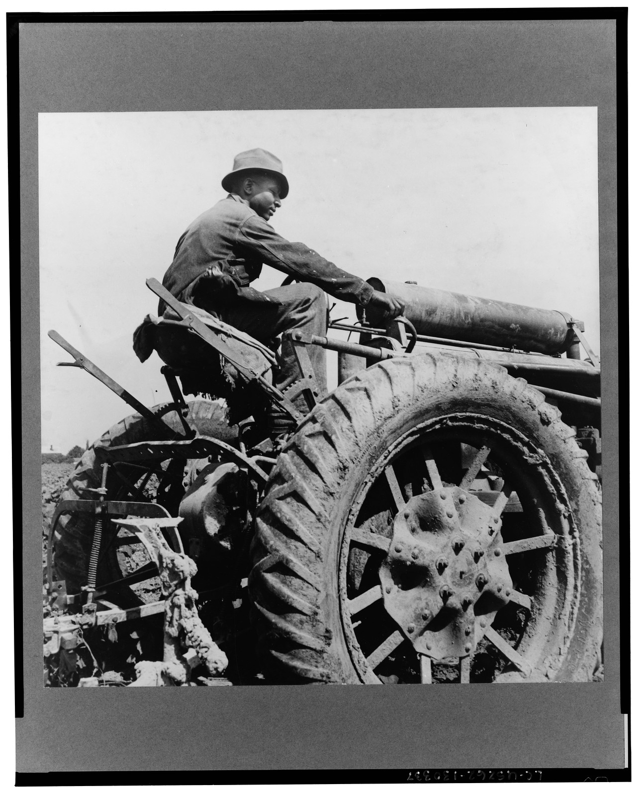Tractor driver. Aldridge Plantation, Mississippi, 1937 June. — historic photograph