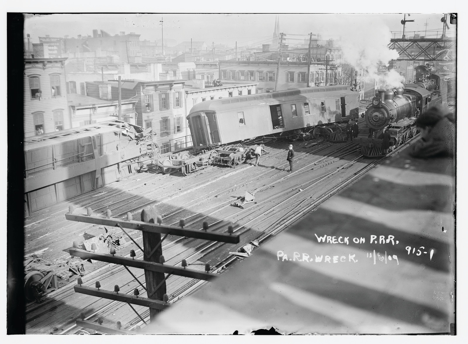Wrecked Pennsylvania R.R. car on tracks, 10/6/09. — historic photograph