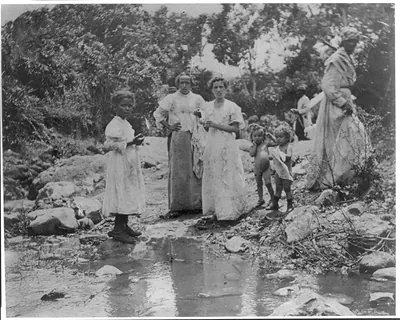 A group of Santiago refugees near El Caney, Cuba, 1898