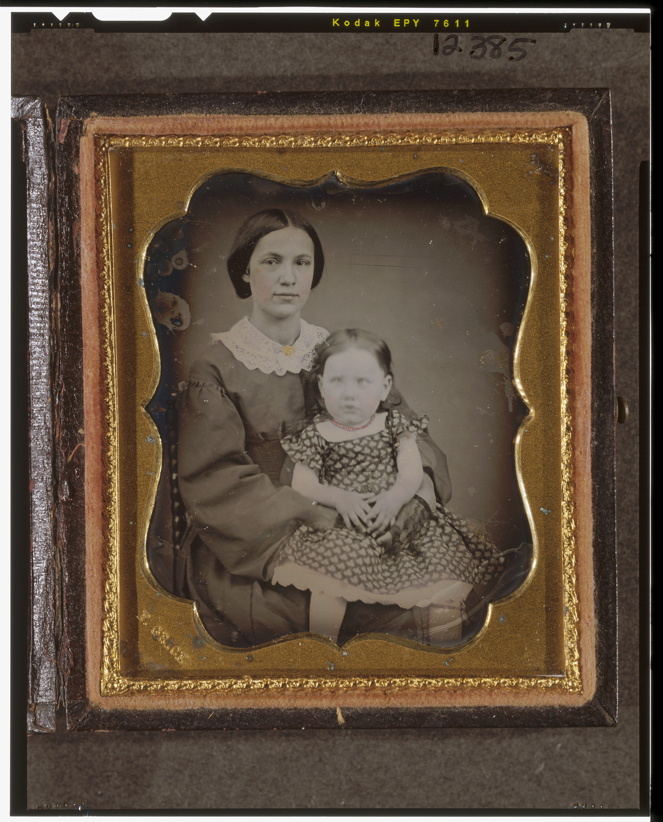 [Unidentified woman and girl, seated, facing front], [ca. 1855] — historic photograph