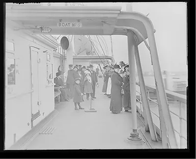 [Children playing quoits on deck of Steamer Comus]