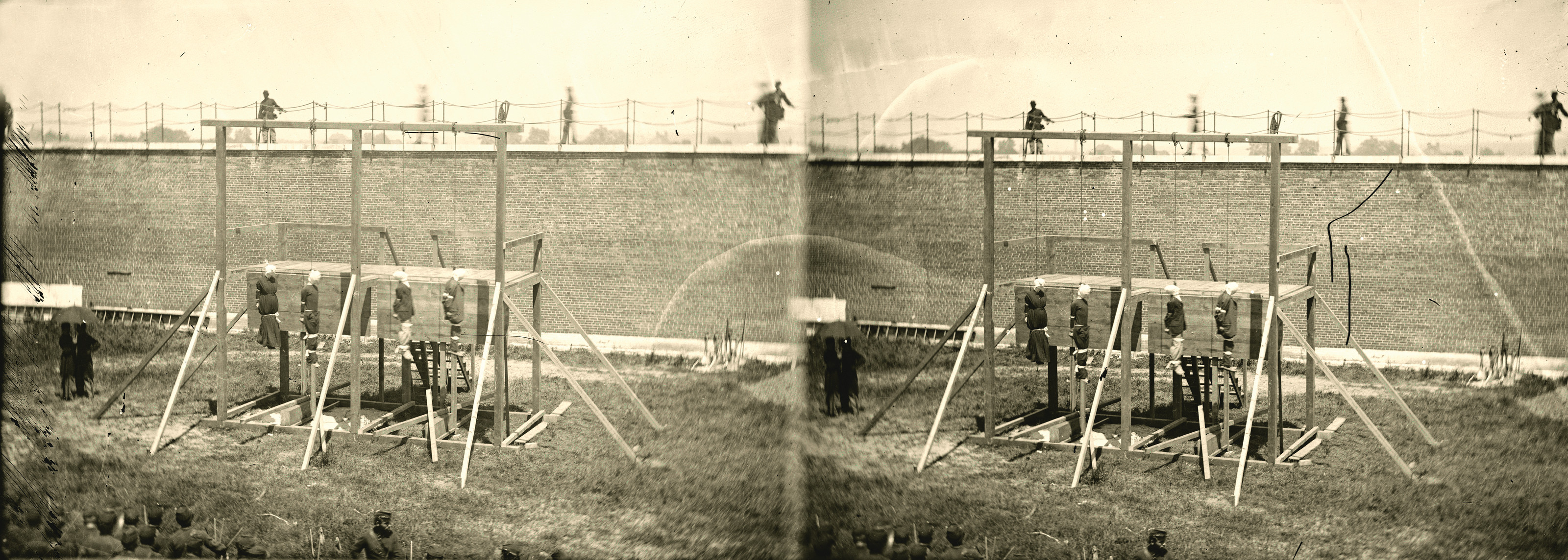 Washington, D.C. Hanging Bodies Of The Conspirators; Guards Only In Yard, July 7, 1865 — historic photograph