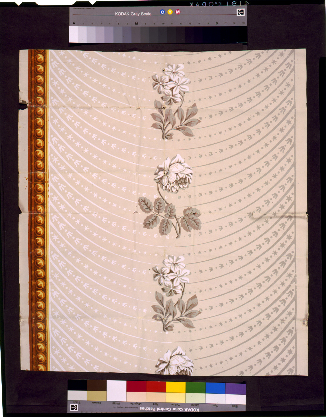 [Wallpaper design number forty three, by Messrs. Virchaux & Co. Ground imitating a drapery, shaded and lighted by stripes and ornaments in sections of a circle, printed in grey and white on a lighter grey ground. The center is ornamented with ascending bunches of roses and cape jessamine alternately, on one side a bar ascending composed of pearls, gold colors], c1814. — historic drawing