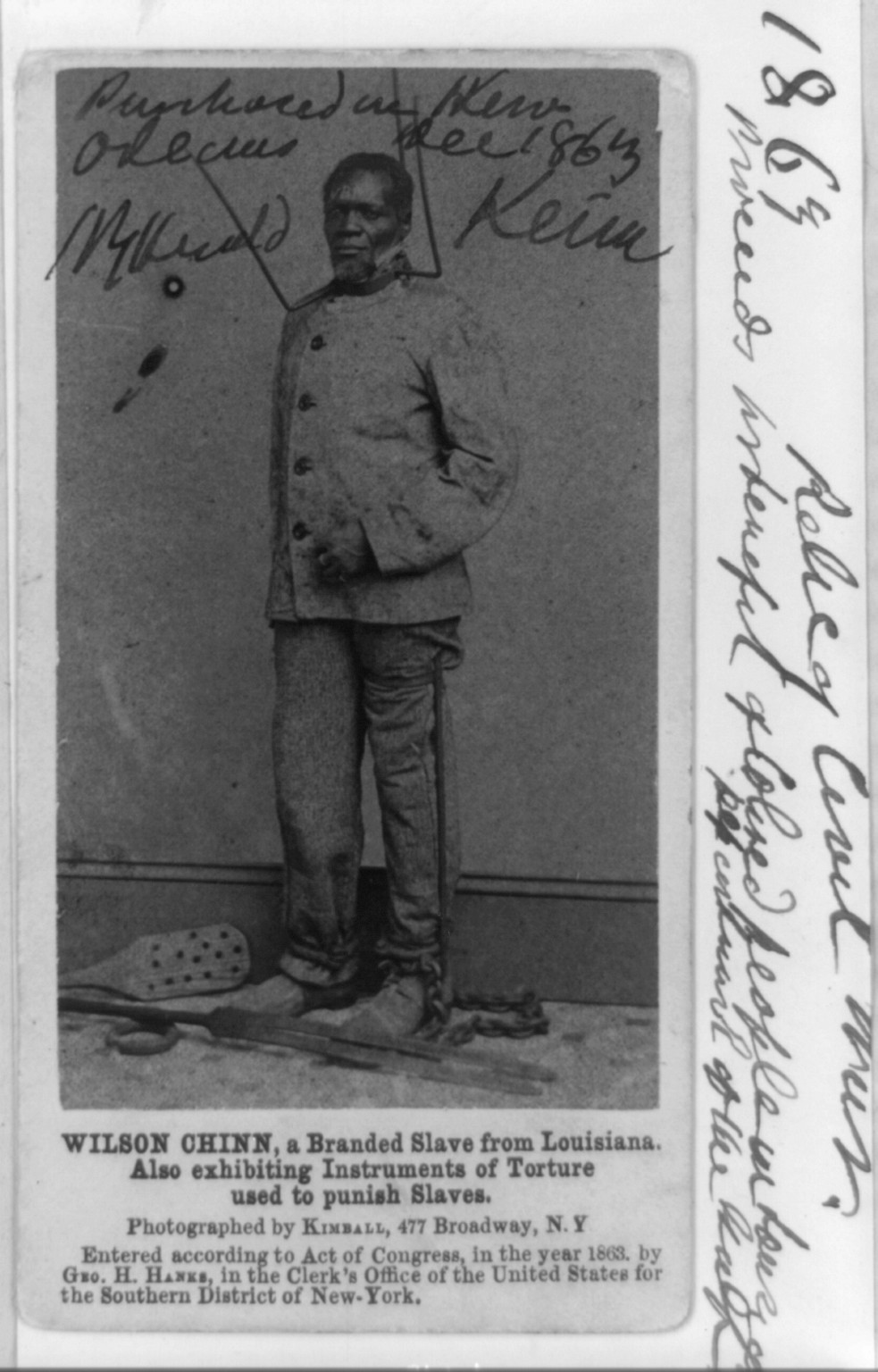 Wilson Chinn, a branded slave from Louisiana--Also exhibiting instruments of torture used to punish slaves, c1863. — historic photograph