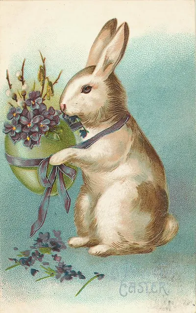 Vintage Easter card with rabbit, violets and egg