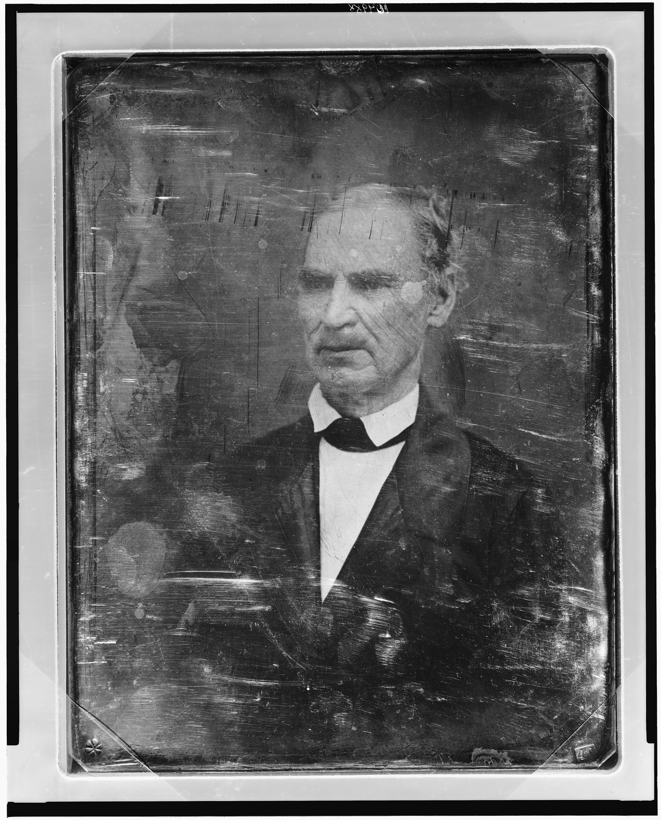 Daguerreotype portrait of an unidentified man in a bow tie, 1848 — historic photograph