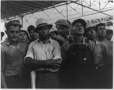 Workers in new Johns-Manville plant listening to safety talk from the superintendent of construction, Jarratt, Va.