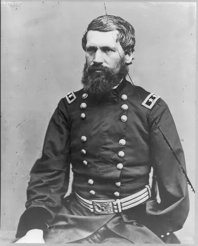 [Oliver O. Howard, half-length portrait, seated, in Major General uniform]