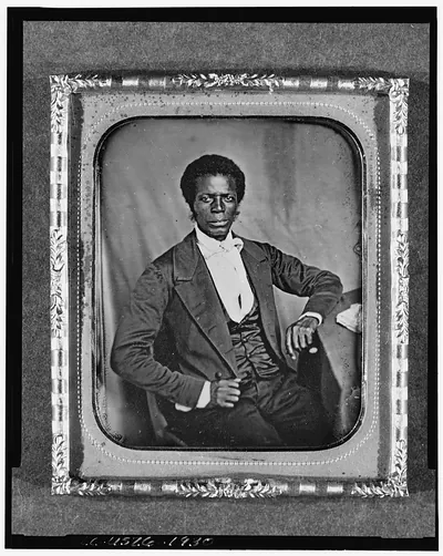 [James M. Priest, three-quarter length portrait, full face, seated at desk]