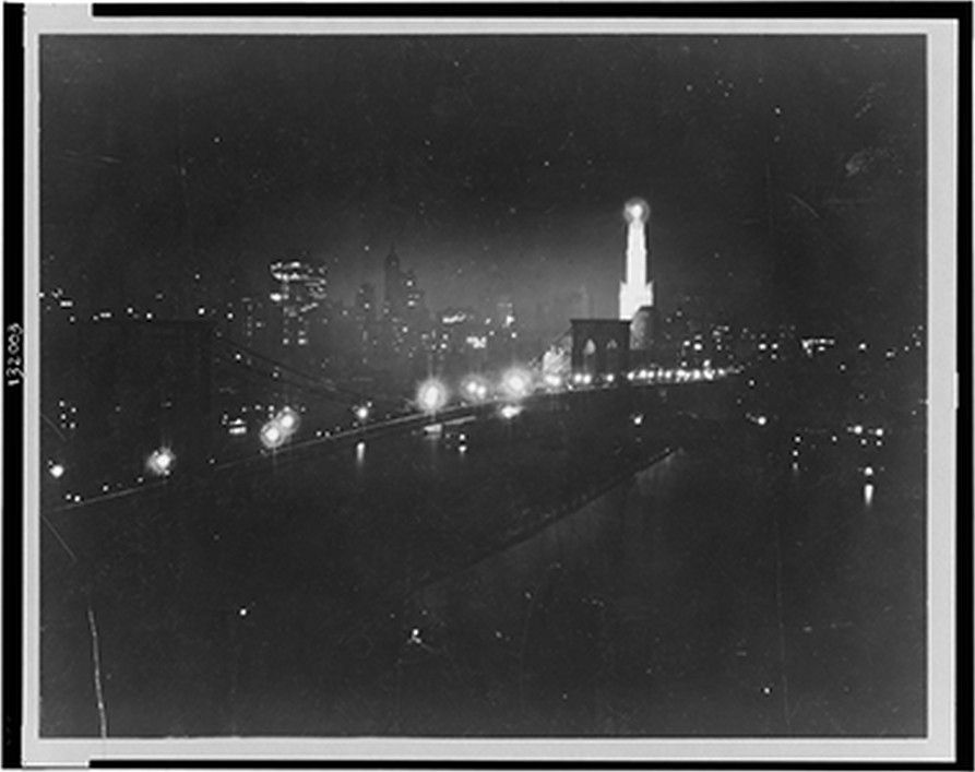 New York by Sperry searchlight, skyline from East River, 1919 Mar. 31. — historic photograph