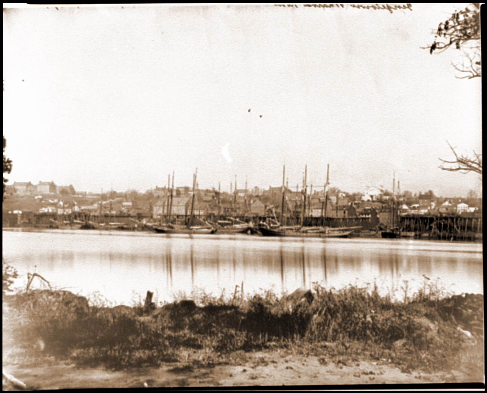 Washington D.C. Georgetown waterfront with sailing vessels seen from Masons Island, 1865 — historic photograph