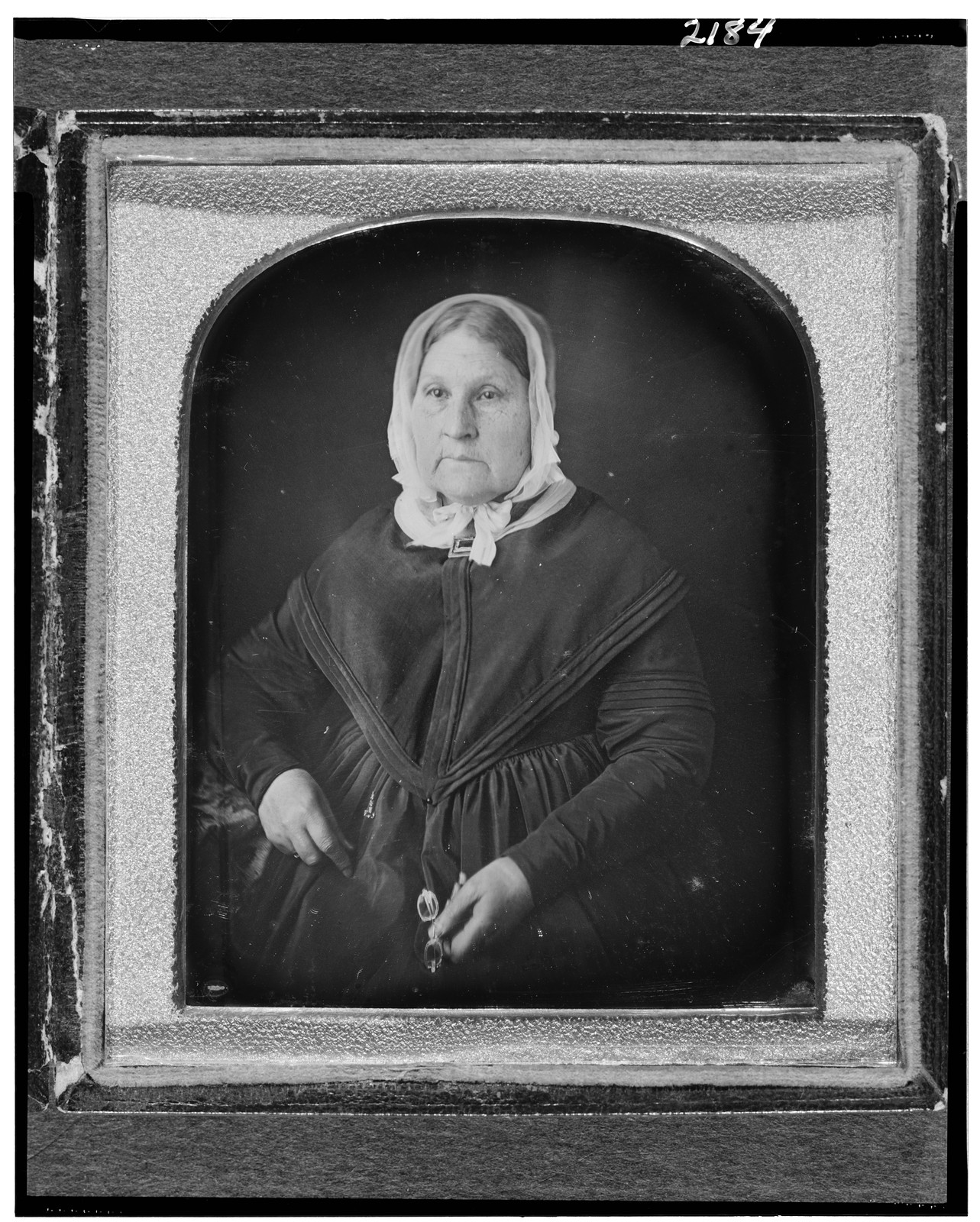 [Mary Manuel Lisa, half-length portrait, facing slightly left, seated, holding glasses], [between 1840 and 1860] — historic photograph