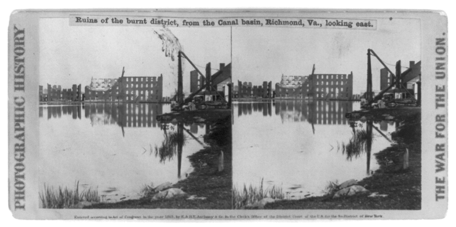 Ruins of the burnt district, from the Canal basin, Richmond, Va., looking east [Civil War], c1865. — historic photograph